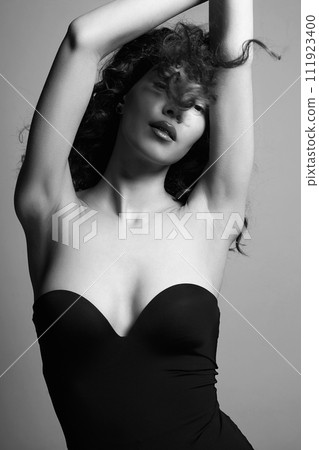 black and white portrait of pretty sexual girl with flying Hair black and white portrait of pretty sexual girl with flying Hair 111923400