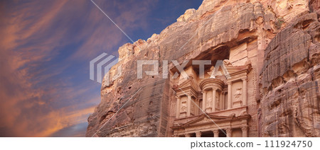 Al Khazneh or The Treasury (against the background of a beautiful sky with clouds). Petra, Jordan-- it is a symbol of Jordan, as well as Jordan's most-visited tourist attraction 111924750