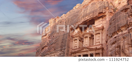 Al Khazneh or The Treasury (against the background of a beautiful sky with clouds). Petra, Jordan-- it is a symbol of Jordan, as well as Jordan's most-visited tourist attraction 111924752