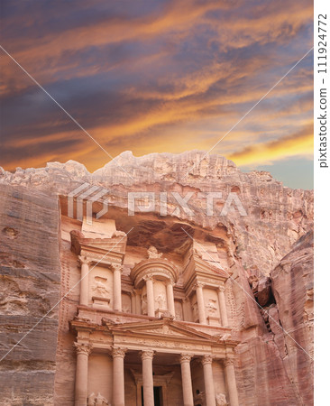 Al Khazneh or The Treasury (against the background of a beautiful sky with clouds). Petra, Jordan-- it is a symbol of Jordan, as well as Jordan's most-visited tourist attraction 111924772