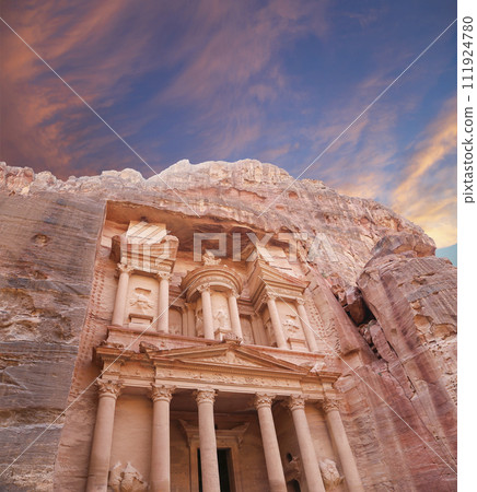 Al Khazneh or The Treasury (against the background of a beautiful sky with clouds). Petra, Jordan-- it is a symbol of Jordan, as well as Jordan's most-visited tourist attraction 111924780