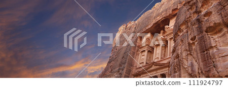 Al Khazneh or The Treasury (against the background of a beautiful sky with clouds). Petra, Jordan-- it is a symbol of Jordan, as well as Jordan's most-visited tourist attraction 111924797
