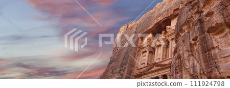 Al Khazneh or The Treasury (against the background of a beautiful sky with clouds). Petra, Jordan-- it is a symbol of Jordan, as well as Jordan's most-visited tourist attraction Al Khazneh or The Treasury (against the background of a beautiful sky with clouds). Petra, Jordan-- it is a symbol of Jordan, as well as Jordan's most-visited tourist attraction 111924798
