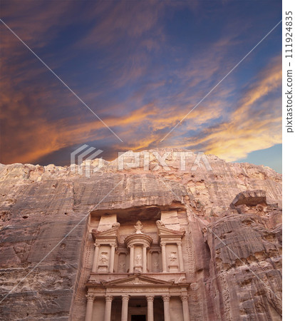 Al Khazneh or The Treasury (against the background of a beautiful sky with clouds). Petra, Jordan-- it is a symbol of Jordan, as well as Jordan's most-visited tourist attraction 111924835