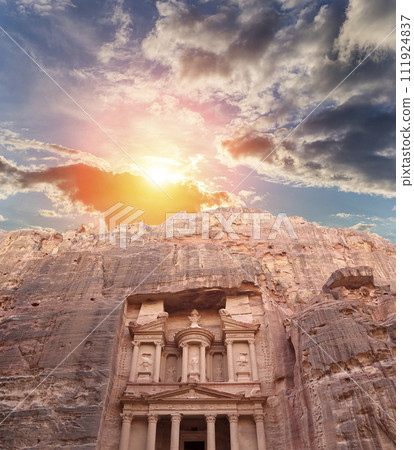 Al Khazneh or The Treasury (against the background of a beautiful sky with clouds). Petra, Jordan-- it is a symbol of Jordan, as well as Jordan's most-visited tourist attraction 111924837