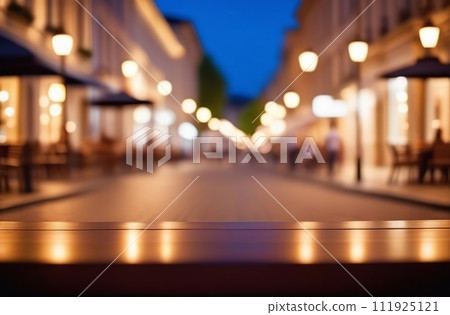 Abstract blur evening city street road lighting bokeh for background. Defocused street scene. Blurred of main street, headlamps. Outdoor busy modern life concept. Suitable for web and magazine layouts 111925121