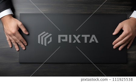 A professional businessman works at his desk. A professional businessman works at his desk. 111925538