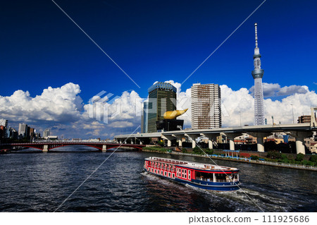View towards Azumabashi from Sumida River and Komagata Bridge. Tokyo Suka Tree and water bus View towards Azumabashi from Sumida River and Komagata Bridge. Tokyo Suka Tree and water bus 111925686