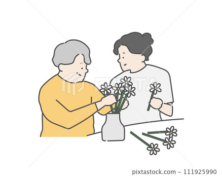Elderly woman enjoying recreation and female caregiver, fresh flowers, flower arrangement 111925990