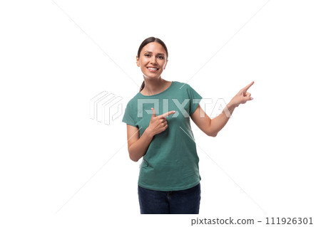 a young woman with black hair and a slender figure dressed in a green T-shirt attracts attention a young woman with black hair and a slender figure dressed in a green T-shirt attracts attention 111926301