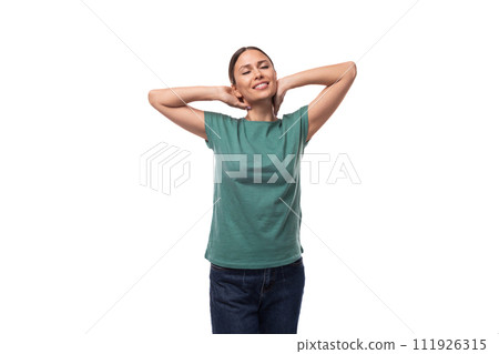 30 year old positive brunette woman with collected hair is dressed in a green basic t-shirt on an 30 year old positive brunette woman with collected hair is dressed in a green basic t-shirt on an 111926315