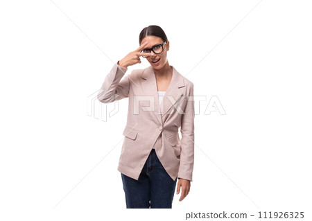 young perplexed slender european brunette woman stands thoughtfully on a white background 111926325