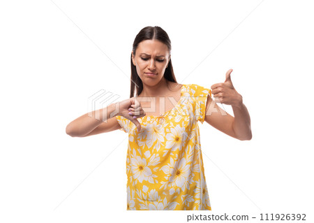 young attractive brunette woman showing like and dislike 111926392