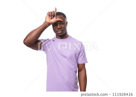 a young American man with a short haircut is dressed in a basic light lilac t-shirt with space for 111926416