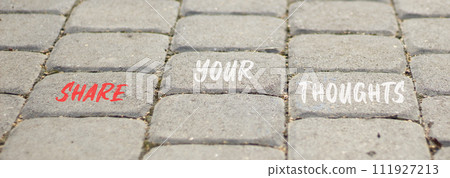 Share your thoughts symbol. Concept words Share your thoughts on beautiful grey paving slabs. Beautiful grey paving slabs background. Business share your thoughts concept. Copy space. Share your thoughts symbol. Concept words Share your thoughts on beautiful grey paving slabs. Beautiful grey paving slabs background. Business share your thoughts concept. Copy space. 111927213