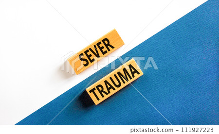 Sever trauma symbol. Concept words Sever trauma on wooden blocks. Beautiful white and blue background. Psychological and sever trauma concept. Copy space. Sever trauma symbol. Concept words Sever trauma on wooden blocks. Beautiful white and blue background. Psychological and sever trauma concept. Copy space. 111927223