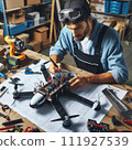 Engineer working on racing fpv drone combat kamikaze bomber in workshop. 111927539