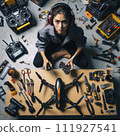 Engineer working on racing fpv drone combat kamikaze bomber in workshop. 111927541