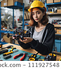 Engineer working on racing fpv drone combat kamikaze bomber in workshop. 111927548