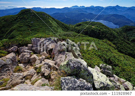 View of Mt. Hushigatake and Mt. Shibayasu and the mountain range of Ozenuma and Nikko View of Mt. Hushigatake and Mt. Shibayasu and the mountain range of Ozenuma and Nikko 111928967