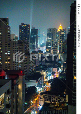 Bangkok skyline view at night from a rooftop restaurant, Bangkok Thailand Bangkok skyline view at night from a rooftop restaurant, Bangkok Thailand 111933613
