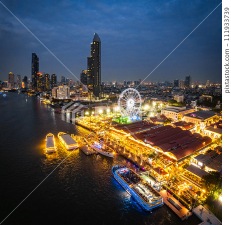 Aerial view of Asiatique The Riverfront open night market at the Chao Phraya river in Bangkok Aerial view of Asiatique The Riverfront open night market at the Chao Phraya river in Bangkok 111933739