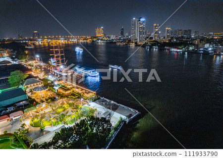 Aerial view of Asiatique The Riverfront open night market at the Chao Phraya river in Bangkok Aerial view of Asiatique The Riverfront open night market at the Chao Phraya river in Bangkok 111933790