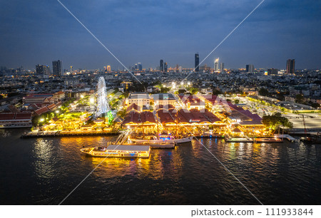 Aerial view of Asiatique The Riverfront open night market at the Chao Phraya river in Bangkok 111933844