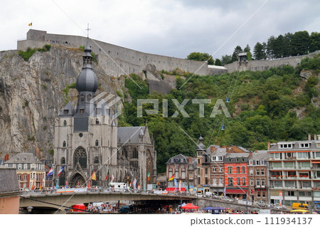 Dinant, a city in the Walloon region of Namur, Belgium in Western Europe, view of Notre Dame church and Citadelle fortress 111934137