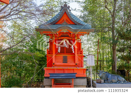 Takarazuka Shrine in Shamachi, Takarazuka City, Hyogo Prefecture, Setsuseisha (Tenma Shrine) and the sacred cow 111935324