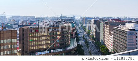 Hakata Ekimae Street stretches from Hakata Station towards Canal City [Hakata cityscape] 111935795