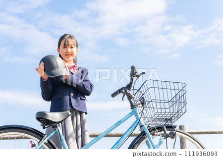 Girl with helmet and bicycle Girl with helmet and bicycle 111936093