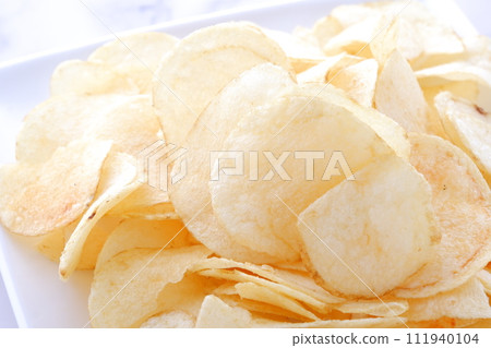potato chips on a plate potato chips on a plate 111940104