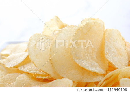 potato chips on a plate potato chips on a plate 111940108