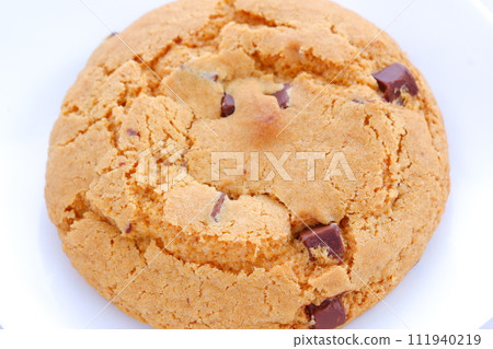 chocolate chip cookies on a white plate chocolate chip cookies on a white plate 111940219