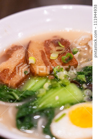 Tonkotsu ramen with soft Pork Belly ,boiled egg and baby bok choy Tonkotsu ramen with soft Pork Belly ,boiled egg and baby bok choy 111944938