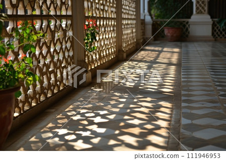 The morning sun creates amazing geometric shadows 111946953