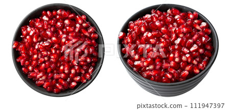 Pomegranate seeds in a bowl. File contains clipping path. Pomegranate seeds in a bowl. File contains clipping path. 111947397