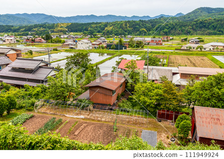 Countryside scenery in the fresh green season: Countryside, cityscape and mountains Countryside scenery in the fresh green season: Countryside, cityscape and mountains 111949924