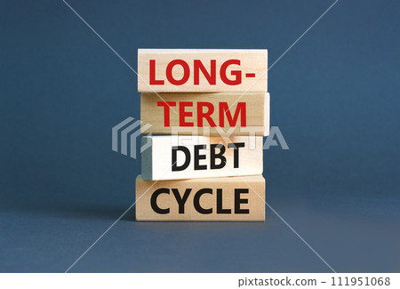Long-term debt cycle symbol. Concept words Long-term debt cycle on beautiful wooden block. Beautiful grey table grey background. Business Long-term debt cycle concept. Copy space. Long-term debt cycle symbol. Concept words Long-term debt cycle on beautiful wooden block. Beautiful grey table grey background. Business Long-term debt cycle concept. Copy space. 111951068