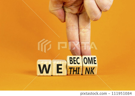 We become or think symbol. Concept word We think We become on wooden cubes. Beautiful orange table orange background. Businessman hand. Business we become or think concept. Copy space. 111951084