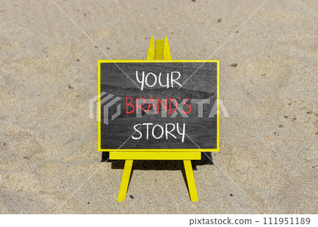 Branding and your brand story symbol. Concept words Your brands story on beautiful black chalk blackboard. Beautiful sand beach background. Business branding your brand story concept. Copy space. 111951189