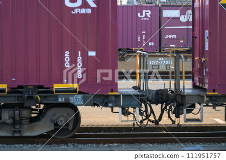 Container cargo stopping at a freight station Container cargo stopping at a freight station 111951757