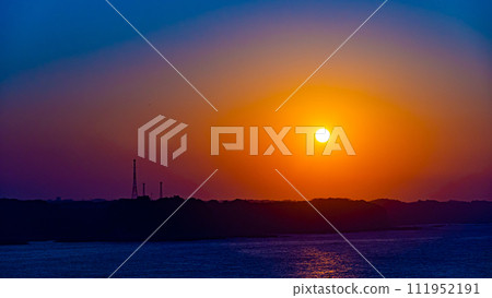 Sunset over the sea 111952191