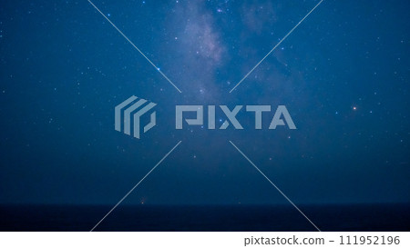 Milky Way floating in the blue sea Milky Way floating in the blue sea 111952196