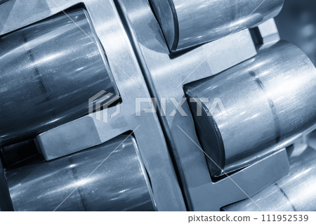 Close up scene the cylindrical rolling bearing parts. Close up scene the cylindrical rolling bearing parts. 111952539