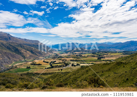 Crown Range Road in New Zealand (panoramic view of Queenstown) Crown Range Road in New Zealand (panoramic view of Queenstown) 111953981