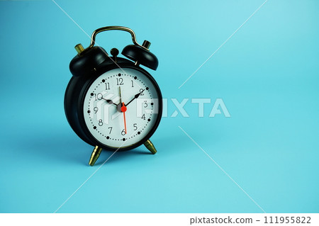 Alarm clock with space copy on blue background 111955822