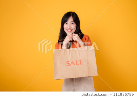Elevate your shopping experience with the shock of the best deals. Smiling woman reveals her purchases, embodying the joy of finding incredible savings. Elevate your shopping experience with the shock of the best deals. Smiling woman reveals her purchases, embodying the joy of finding incredible savings. 111956799