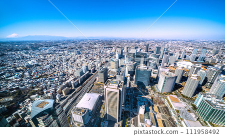 Yokohama cityscape in Japan, overlooking Yokohama Station, Mt. Fuji, and the Minato Mirai office buildings. Shin-Yokohama Station on the right Yokohama cityscape in Japan, overlooking Yokohama Station, Mt. Fuji, and the Minato Mirai office buildings. Shin-Yokohama Station on the right 111958492